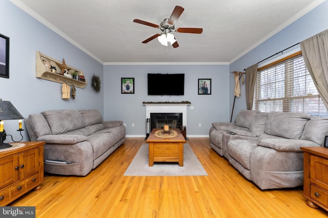 3 Oleander Dr, Stafford, VA 22554 - living area with a fireplace, ceiling fan, crown molding, and light wood-type flooring