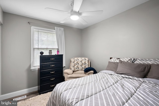 1949 Catoctin Ter, Silver Spring, MD 20906 - bedroom with baseboards, wood finished floors, and a ceiling fan