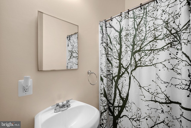1949 Catoctin Ter, Silver Spring, MD 20906 - full bathroom with a sink and a shower with curtain