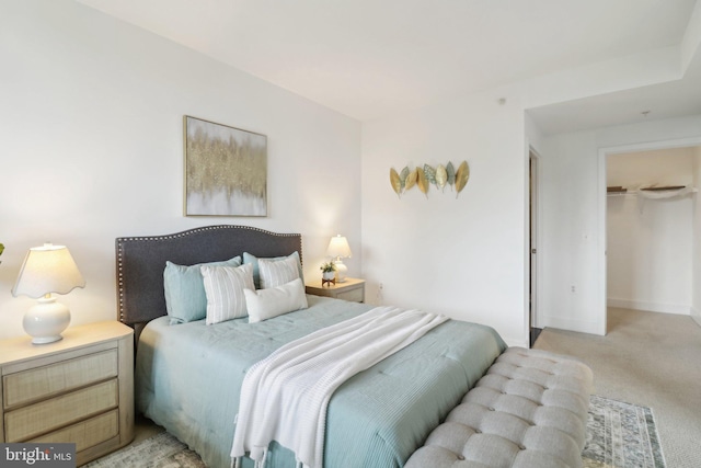 2001 15th St N Unit 207, Arlington, VA 22201 - bedroom featuring light colored carpet and baseboards