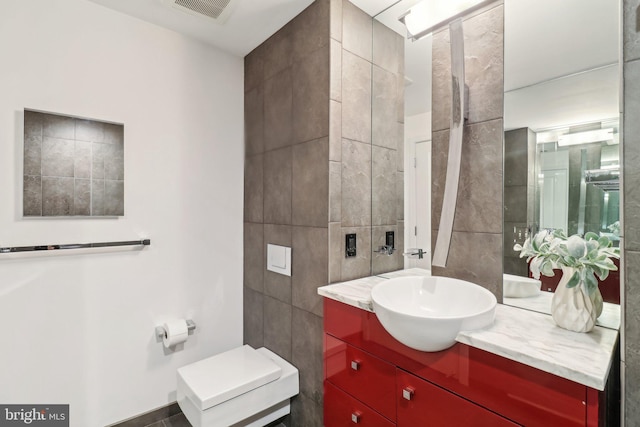 2001 15th St N Unit 207, Arlington, VA 22201 - bathroom with tile walls, vanity, and visible vents
