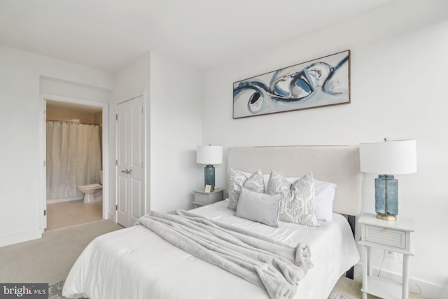 2001 15th St N Unit 207, Arlington, VA 22201 - bedroom with ensuite bath, a closet, and carpet