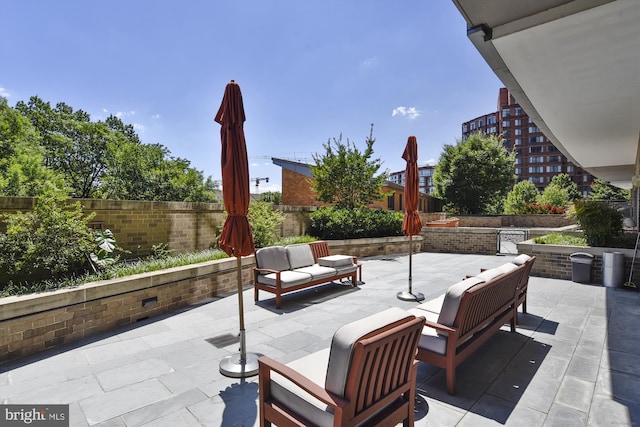 2001 15th St N Unit 207, Arlington, VA 22201 - view of patio with a fenced backyard and an outdoor living space