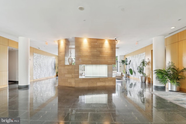 2001 15th St N Unit 207, Arlington, VA 22201 - reception area with a multi sided fireplace