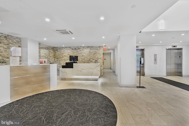 welcome area with recessed lighting