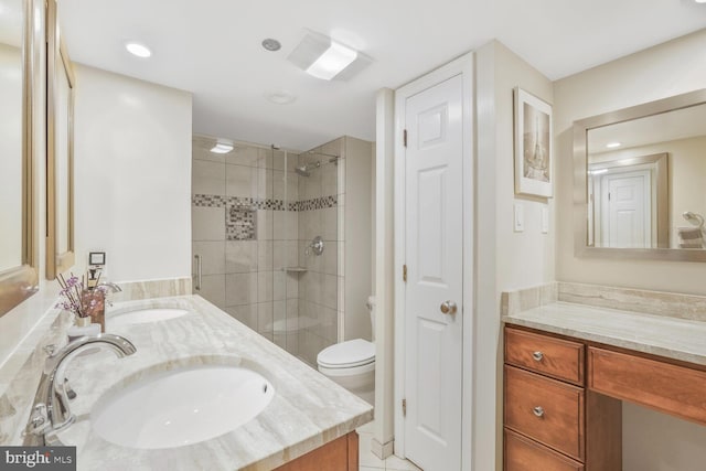 full bath with a shower stall, double vanity, toilet, and recessed lighting