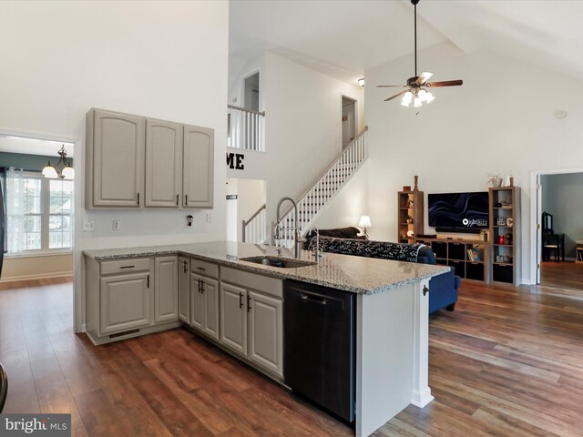 kitchen with high vaulted ceiling, dishwasher, a sink, a ceiling fan, and open floor plan