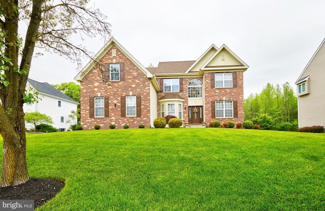 28 Autumnwood Ln, Mount Laurel, NJ 08054 - view of front of home featuring a front yard and brick siding