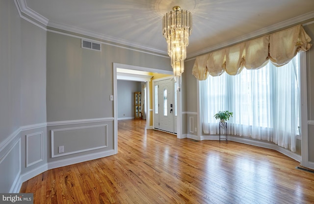 28 Autumnwood Ln, Mount Laurel, NJ 08054 - spare room featuring a chandelier, hardwood / wood-style floors, and crown molding