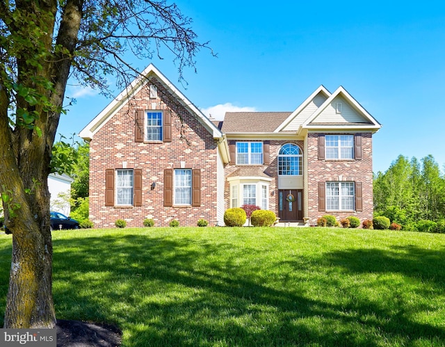 28 Autumnwood Ln, Mount Laurel, NJ 08054 - view of front of home featuring a front yard and brick siding