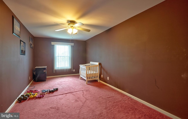 28 Autumnwood Ln, Mount Laurel, NJ 08054 - unfurnished bedroom featuring carpet flooring, baseboards, ceiling fan, and a crib