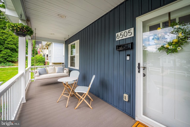deck featuring covered porch
