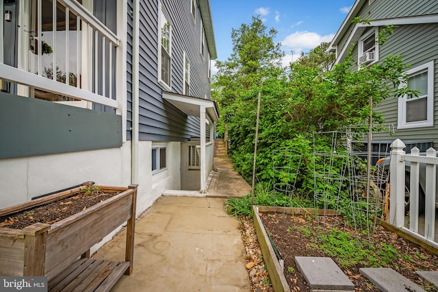 view of yard with a garden and a patio