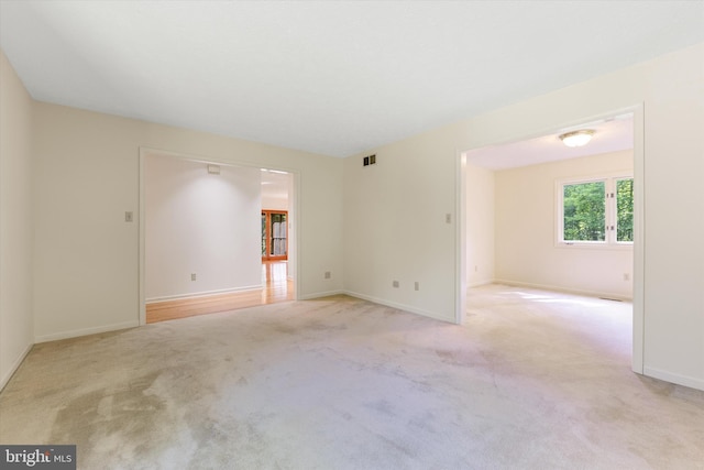 112 Old Forest Cir, Winchester, VA 22602 - spare room featuring light colored carpet and baseboards