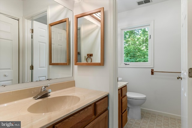 112 Old Forest Cir, Winchester, VA 22602 - bathroom with vanity, toilet, and baseboards