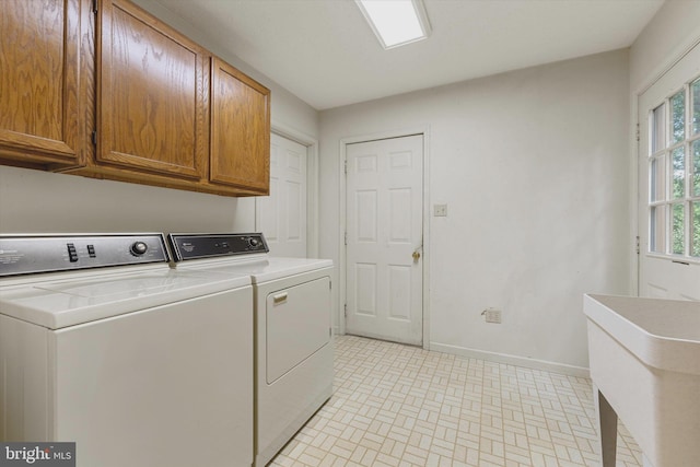 112 Old Forest Cir, Winchester, VA 22602 - laundry area featuring cabinet space, washing machine and clothes dryer, and baseboards