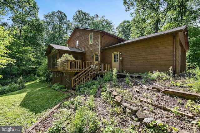 112 Old Forest Cir, Winchester, VA 22602 - rear view of property with a wooden deck, a vegetable garden, stairway, and a yard