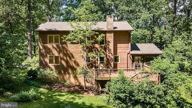 112 Old Forest Cir, Winchester, VA 22602 - rear view of property with a chimney, a wooden deck, and a lawn