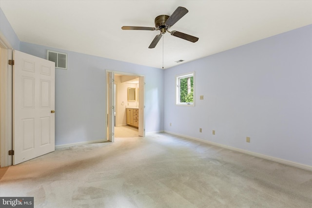 112 Old Forest Cir, Winchester, VA 22602 - unfurnished bedroom with light colored carpet, baseboards, ensuite bathroom, and a ceiling fan
