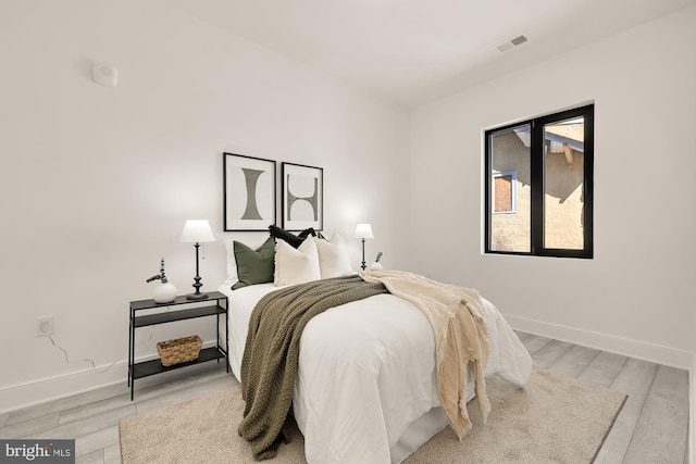 1001 Rhode Island Ave NE Unit 204, Washington, DC 20018 - bedroom with light wood-style flooring and baseboards