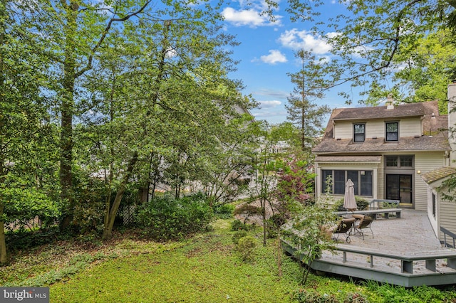 view of yard with a deck