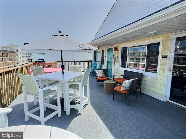 17 143rd St Unit 302, Ocean City, MD 21842 - view of patio / terrace with outdoor dining area