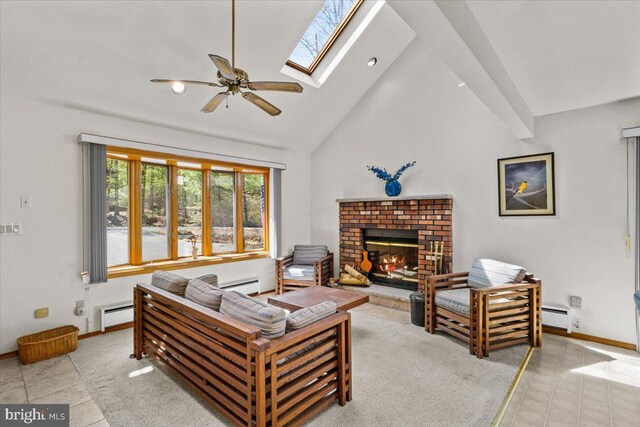 249 Hyland Dr, East Stroudsburg, PA 18301 - living area featuring tile patterned floors, a ceiling fan, a fireplace, and baseboard heating