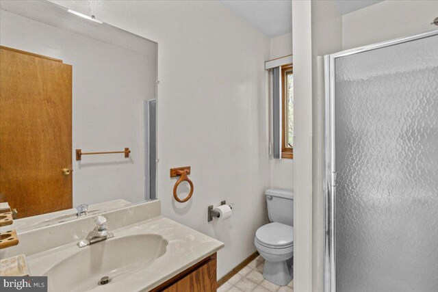 249 Hyland Dr, East Stroudsburg, PA 18301 - full bath with a stall shower, vanity, and toilet