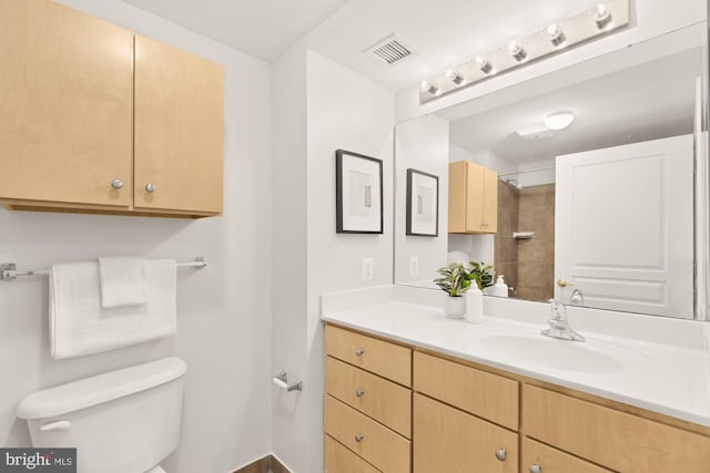 616 E St NW Unit 447, Washington, DC 20004 - full bathroom with vanity, toilet, a shower, and visible vents