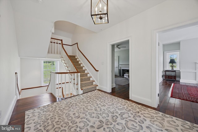 275 S Creek Rd, West Chester, PA 19382 - entrance foyer featuring baseboards, stairway, wood-type flooring, and plenty of natural light