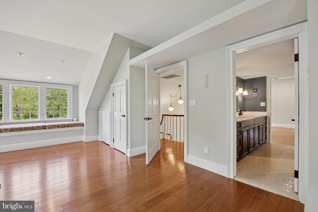 275 S Creek Rd, West Chester, PA 19382 - bonus room featuring a sink, wood-type flooring, and baseboards
