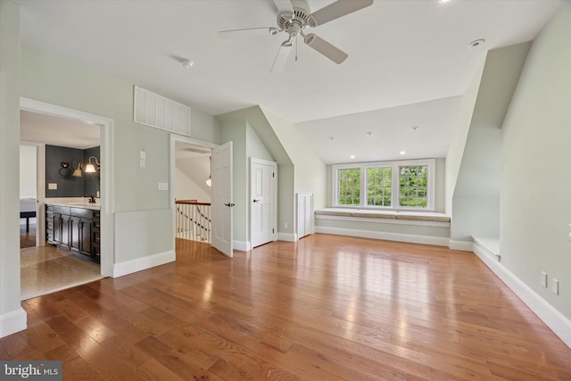 275 S Creek Rd, West Chester, PA 19382 - unfurnished living room with baseboards, vaulted ceiling, ceiling fan, and wood finished floors