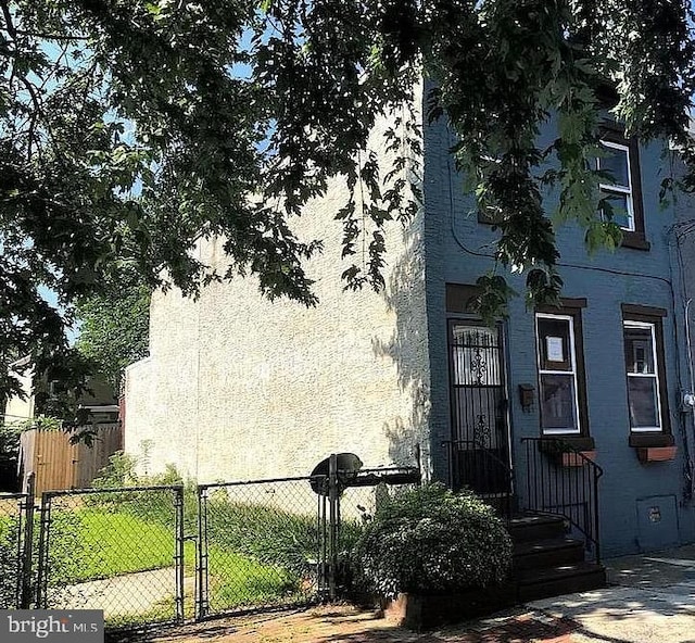 418 Vine St, Camden, NJ 08102 - view of exterior entry with fence and a gate