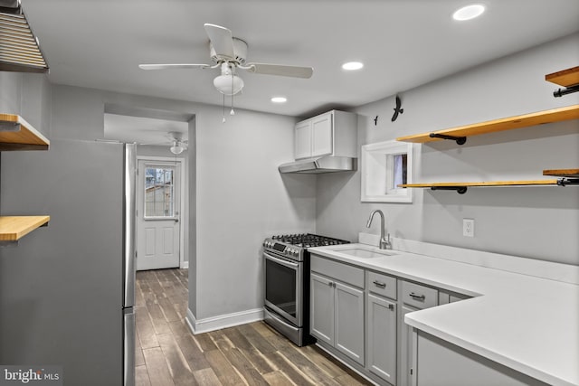418 Vine St, Camden, NJ 08102 - kitchen with open shelves, appliances with stainless steel finishes, ceiling fan, a sink, and under cabinet range hood