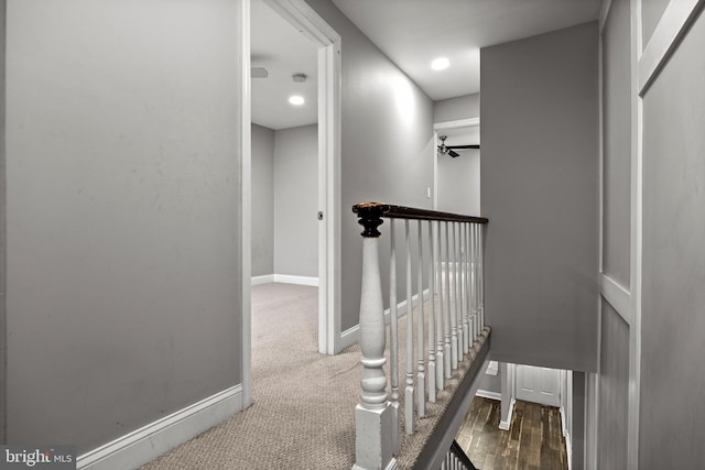 418 Vine St, Camden, NJ 08102 - hallway with baseboards, an upstairs landing, and carpet floors