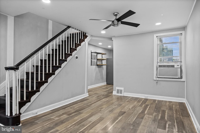 418 Vine St, Camden, NJ 08102 - unfurnished living room with baseboards, wood finished floors, stairway, ceiling fan, and cooling unit