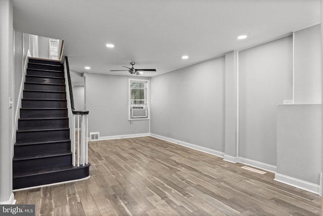 418 Vine St, Camden, NJ 08102 - unfurnished living room featuring wood finished floors, ceiling fan, recessed lighting, stairs, and baseboards