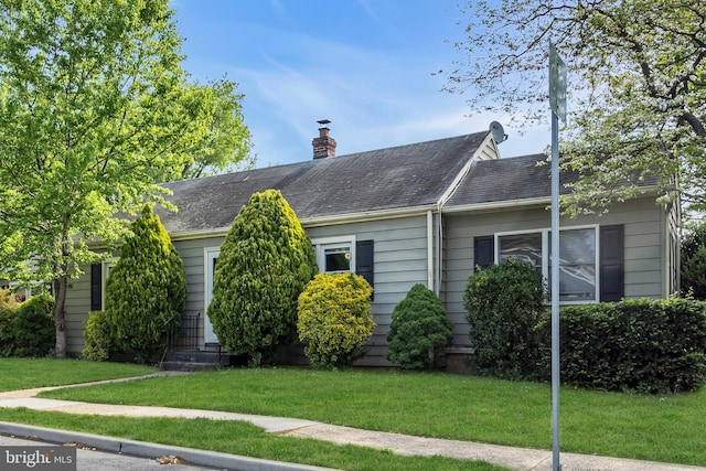 1545 Maple Ave, Haddon Heights, NJ 08035 - view of front of house featuring a front lawn and a chimney