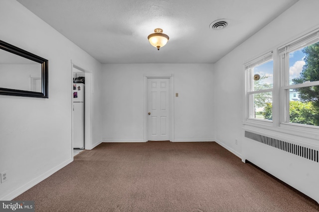 1545 Maple Ave, Haddon Heights, NJ 08035 - unfurnished room with carpet flooring, radiator, and baseboards