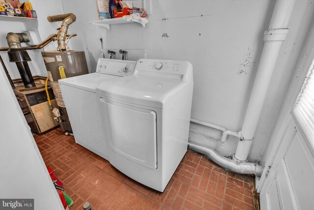 1545 Maple Ave, Haddon Heights, NJ 08035 - clothes washing area featuring separate washer and dryer, brick patterned floors, and water heater