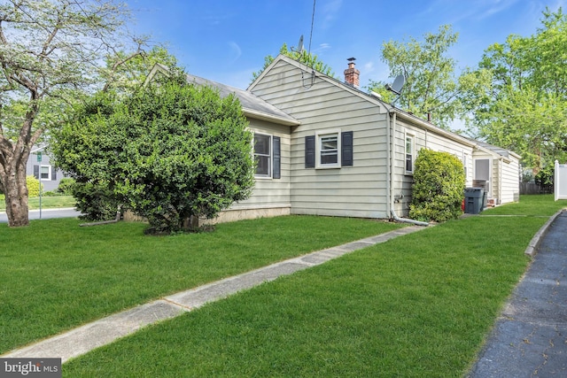 1545 Maple Ave, Haddon Heights, NJ 08035 - view of side of home with a chimney and a yard
