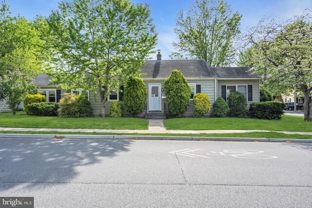 1545 Maple Ave, Haddon Heights, NJ 08035 - view of front facade with a front yard and a chimney