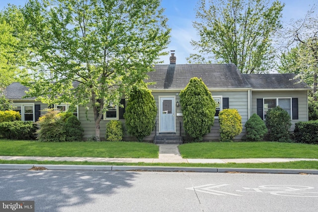 1545 Maple Ave, Haddon Heights, NJ 08035 - view of front of home featuring entry steps, a chimney, and a front yard