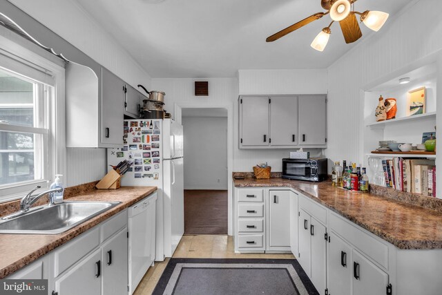 1545 Maple Ave, Haddon Heights, NJ 08035 - kitchen featuring a sink, white appliances, ceiling fan, and plenty of natural light