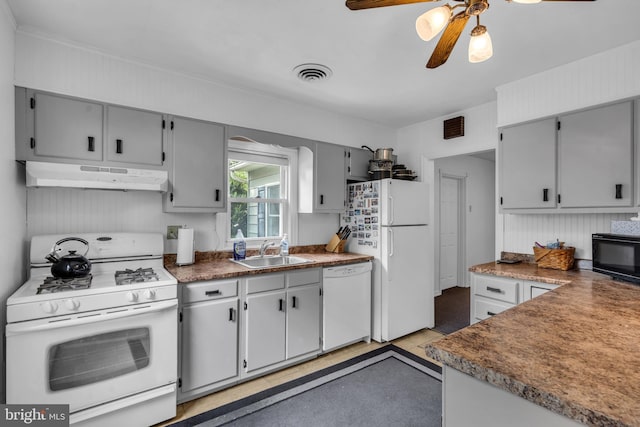 1545 Maple Ave, Haddon Heights, NJ 08035 - kitchen featuring white appliances, under cabinet range hood, a sink, and gray cabinets