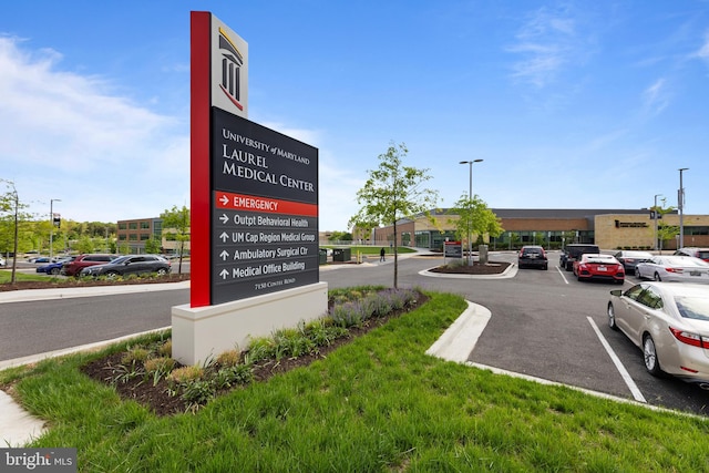 exterior details featuring a parking lot