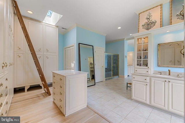 1129 Delaplane Grade Rd, Upperville, VA 20184 - full bathroom featuring a closet, a skylight, vanity, recessed lighting, and a shower with door