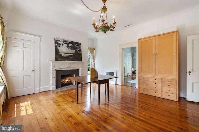 1129 Delaplane Grade Rd, Upperville, VA 20184 - dining area with hardwood / wood-style flooring, a chandelier, ornamental molding, and a high end fireplace