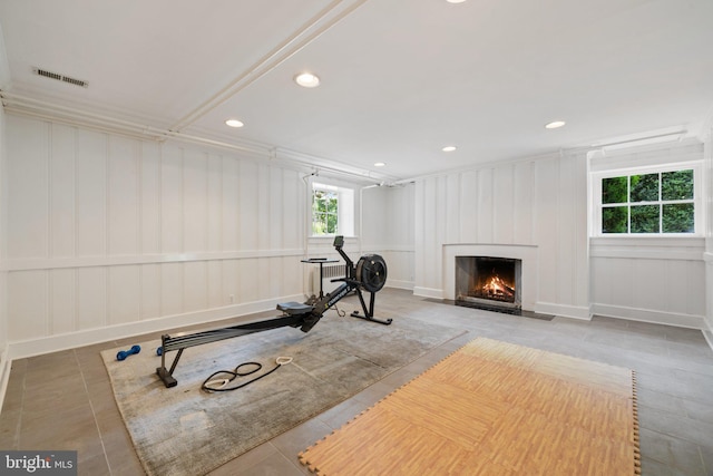 1129 Delaplane Grade Rd, Upperville, VA 20184 - exercise area with a decorative wall, a fireplace with flush hearth, radiator heating unit, and recessed lighting
