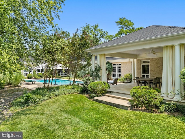 1129 Delaplane Grade Rd, Upperville, VA 20184 - view of green lawn featuring ceiling fan, an outdoor pool, and a deck